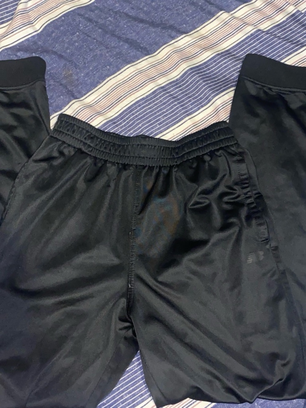 New balance big boy sweatpants size 14-16 can fit an adult size small-xs